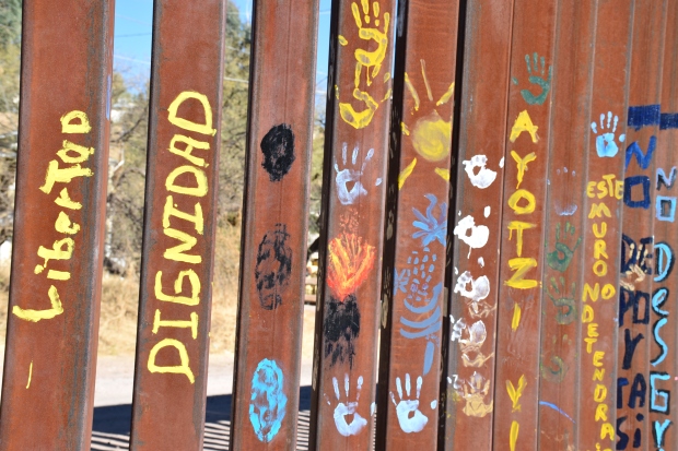 Liberty and Dignity are painted on The Wall - border in Nogales, Mexico
